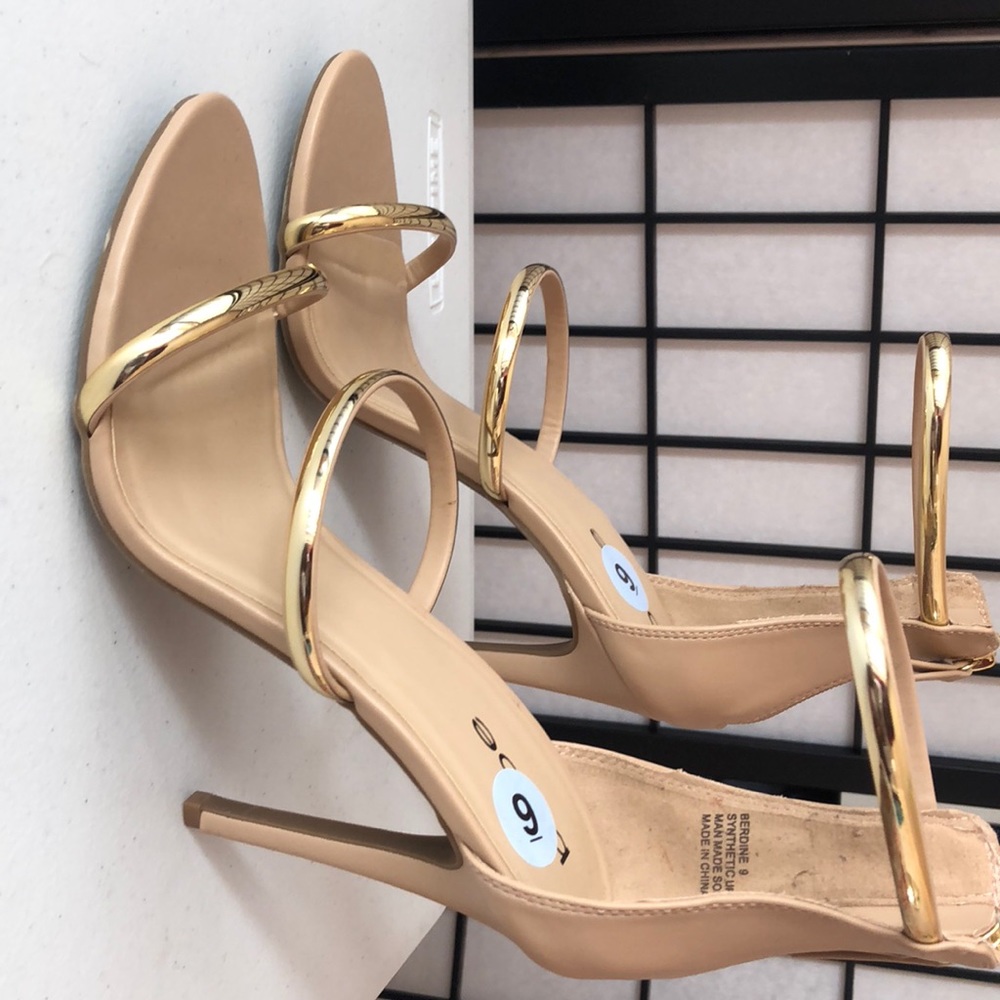 A Fabulous pair of Bebe 3-gold strapped heels!!!